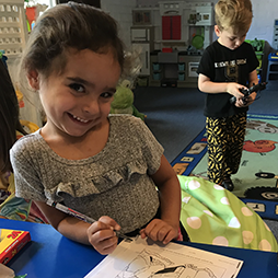 two children smiling in sunday school