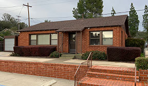 alpine community church brick office as seen from front parking lot